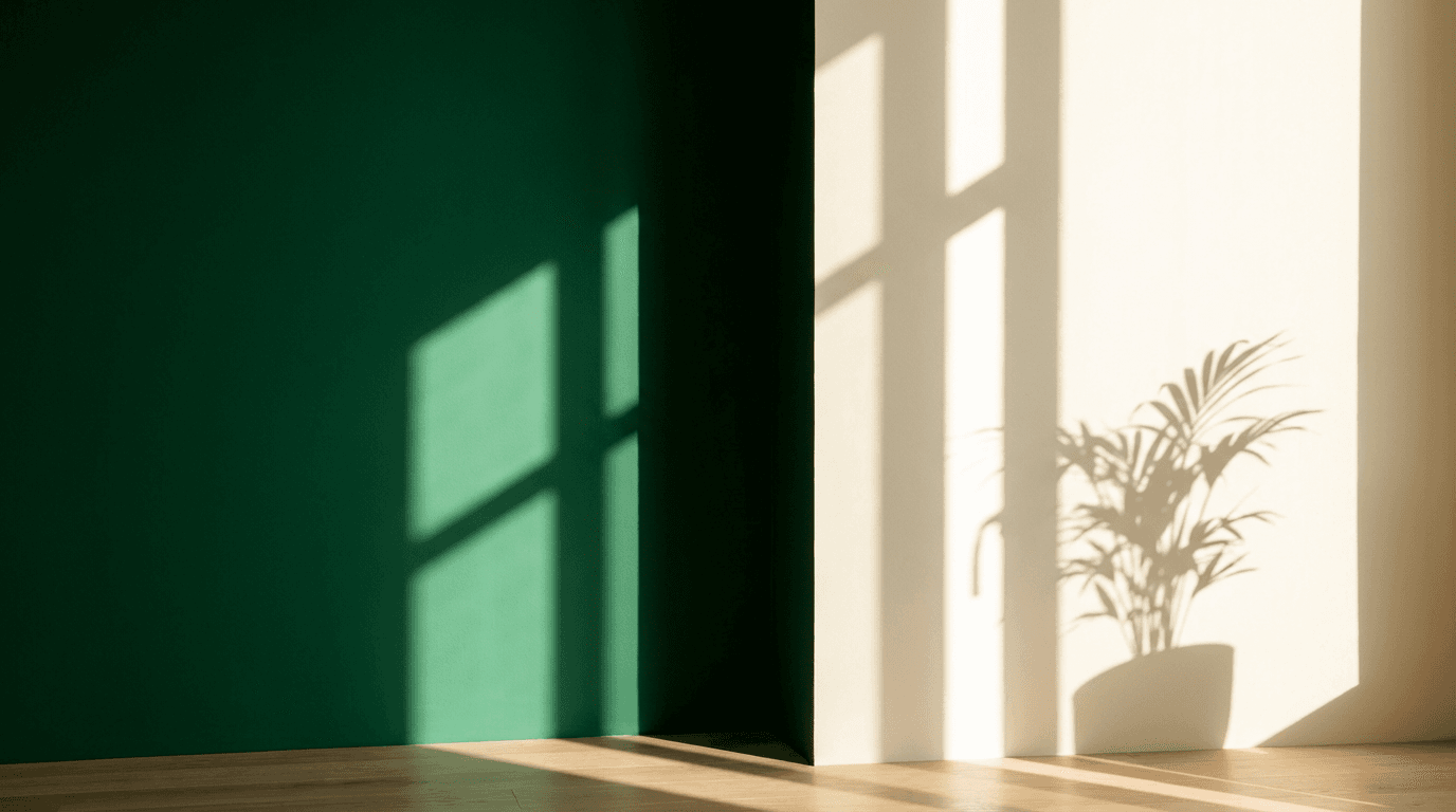 Painter applying premium finish to interior wall with precision brushwork
